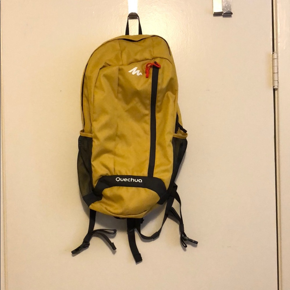 Quechua yellow backpack